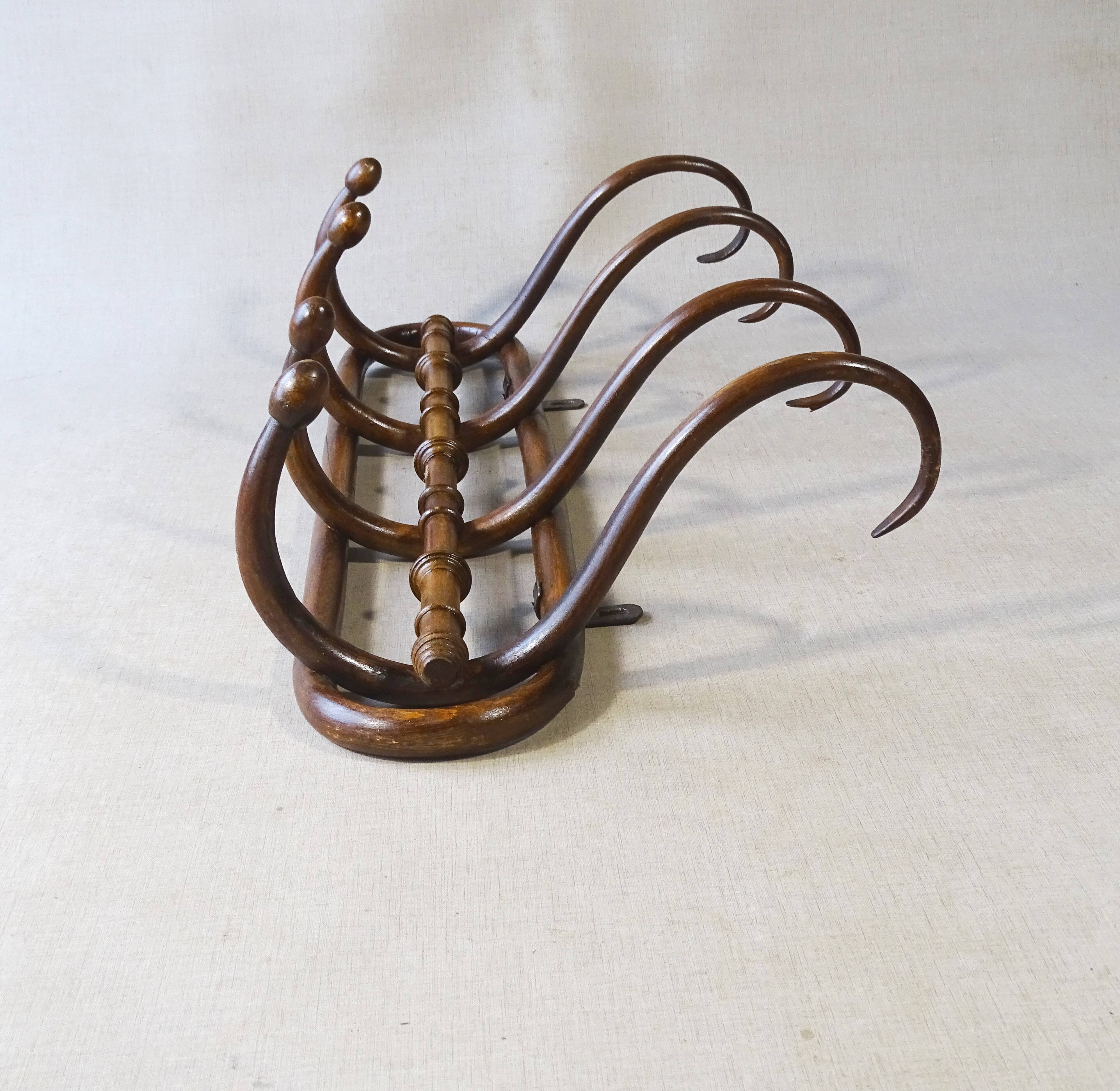Wall coat rack by Kohn, bent wood 1910, no Thonet.