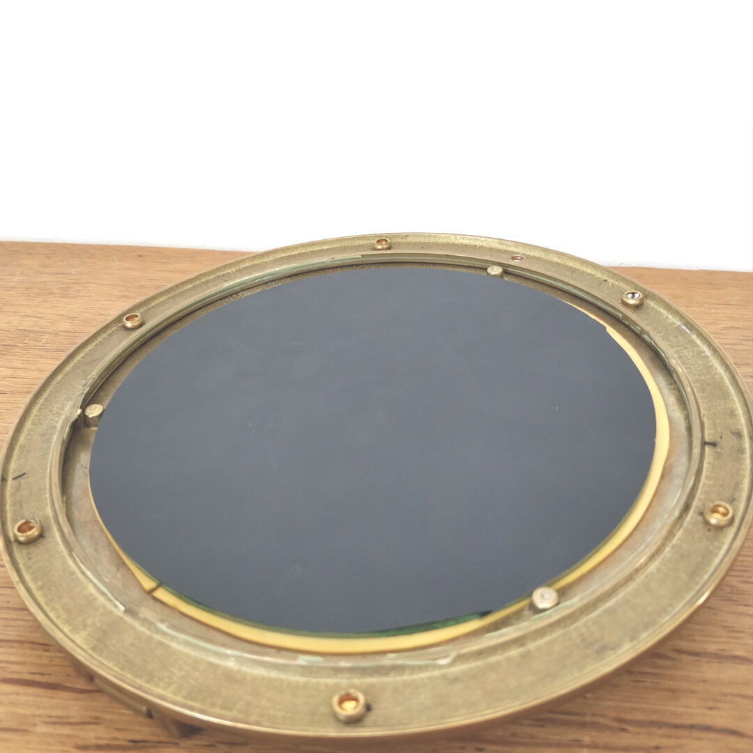 Brass window mirror 21cm diameter