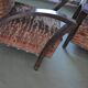 Pair of Art Deco armchairs in curved wood and multicoloured fabric from the 1920s.