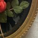 Frame in gilded wood, fabric flowers under vintage curved glass medallion
