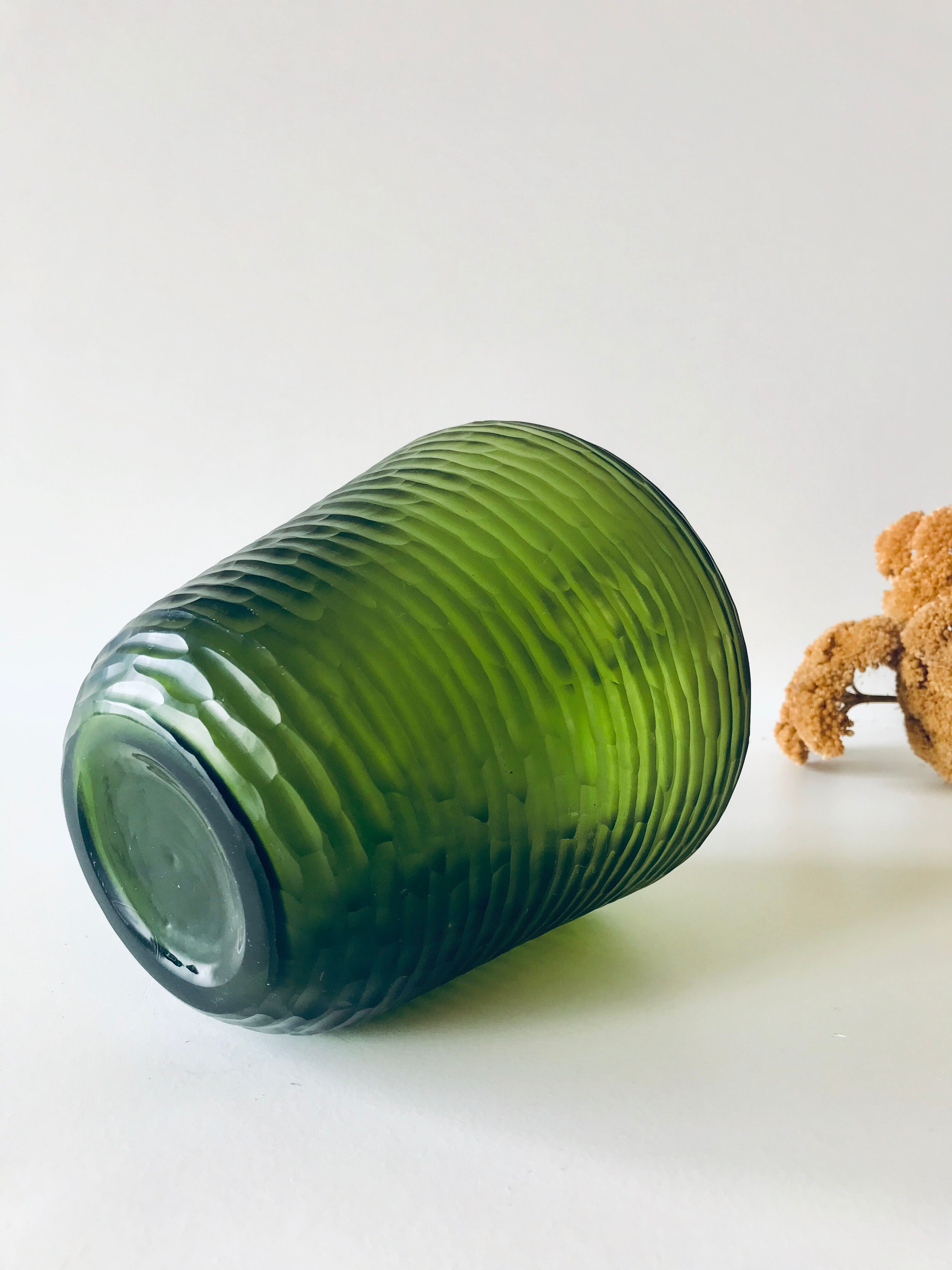 Green carved glass vase