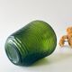 Green carved glass vase