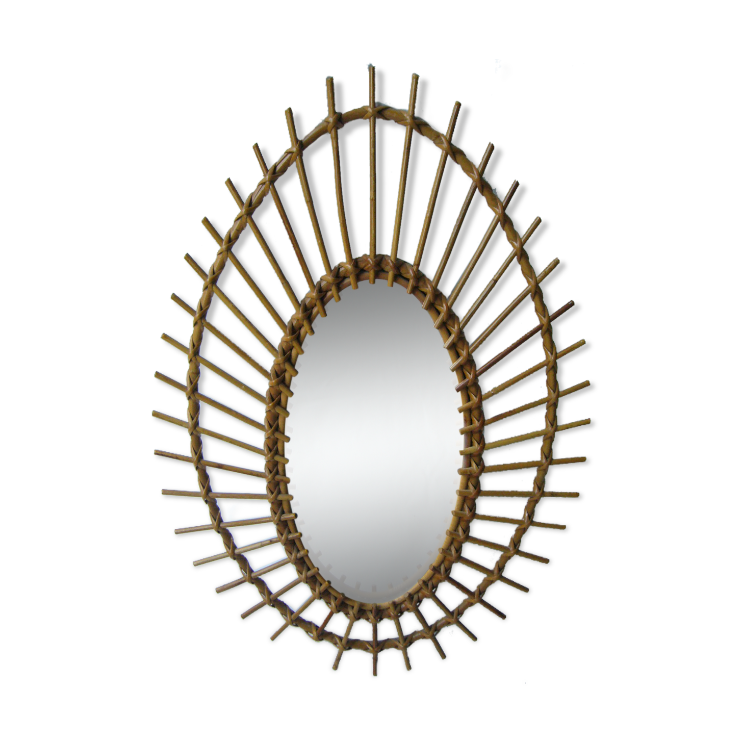 Vintage oval mirror in rattan