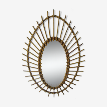 Vintage oval mirror in rattan