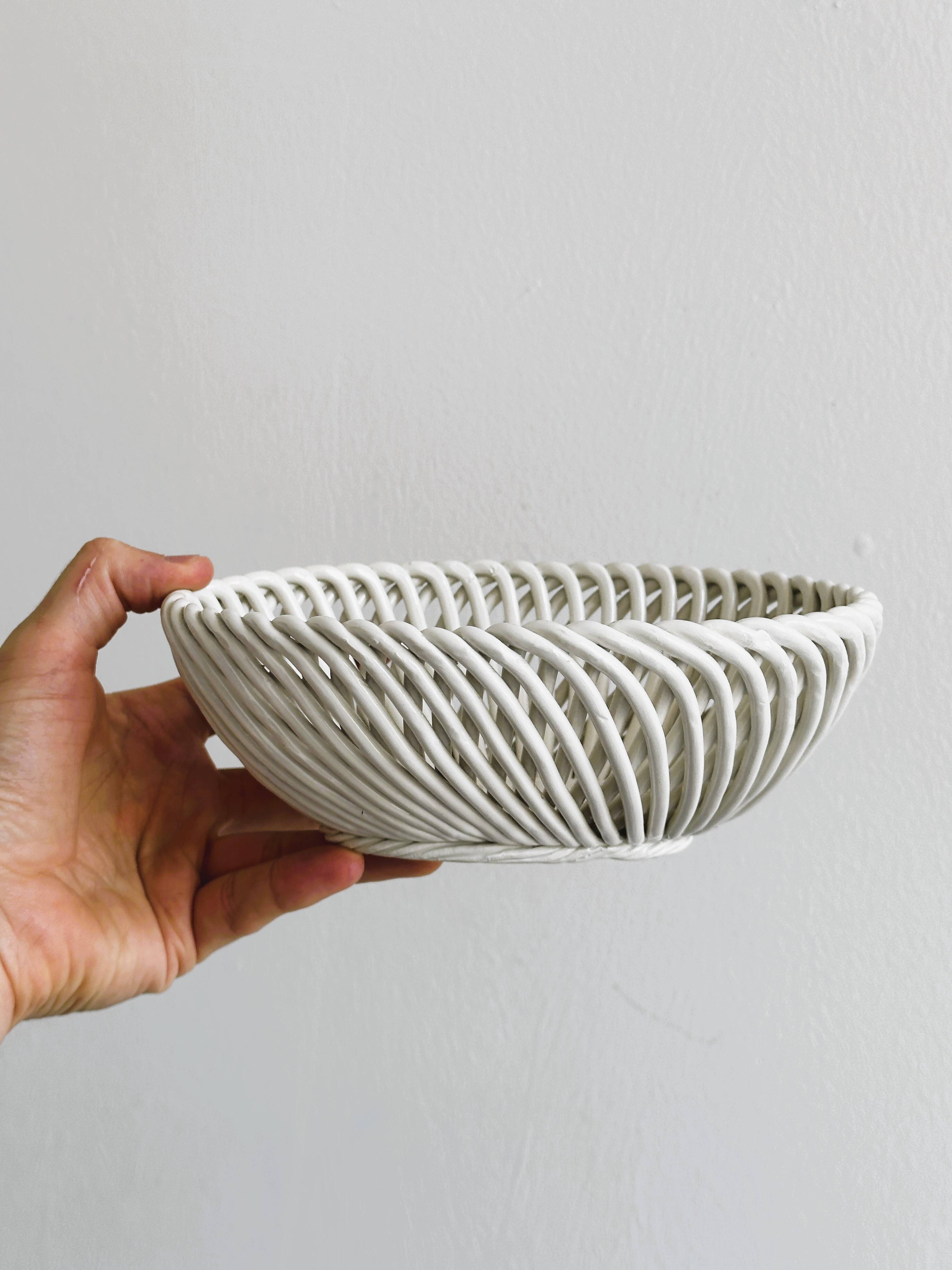 Small white ceramic twisted basket