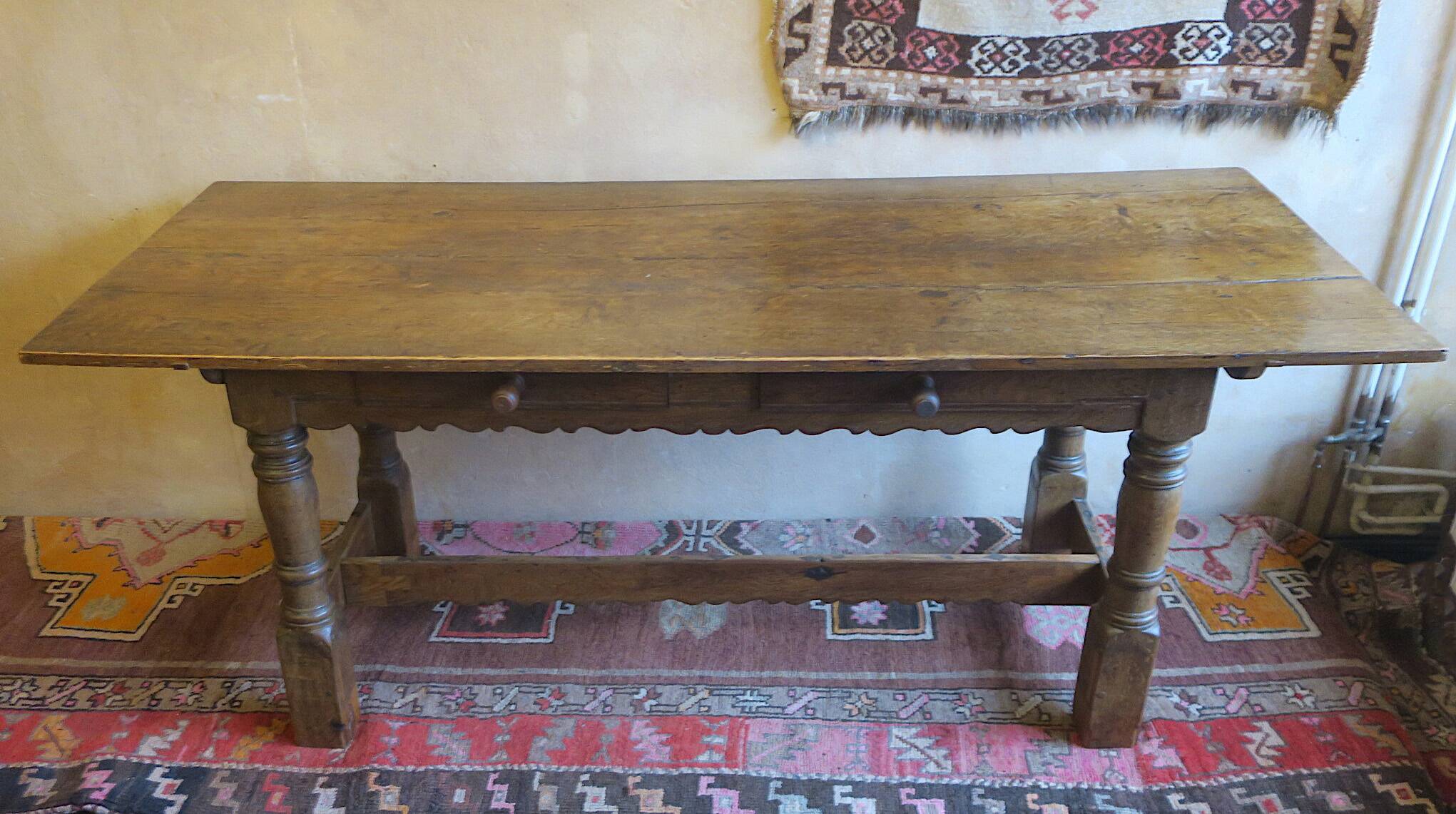 Antique patinated oak dining table, 18th century
