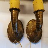 A set of wall lamps in solid brass