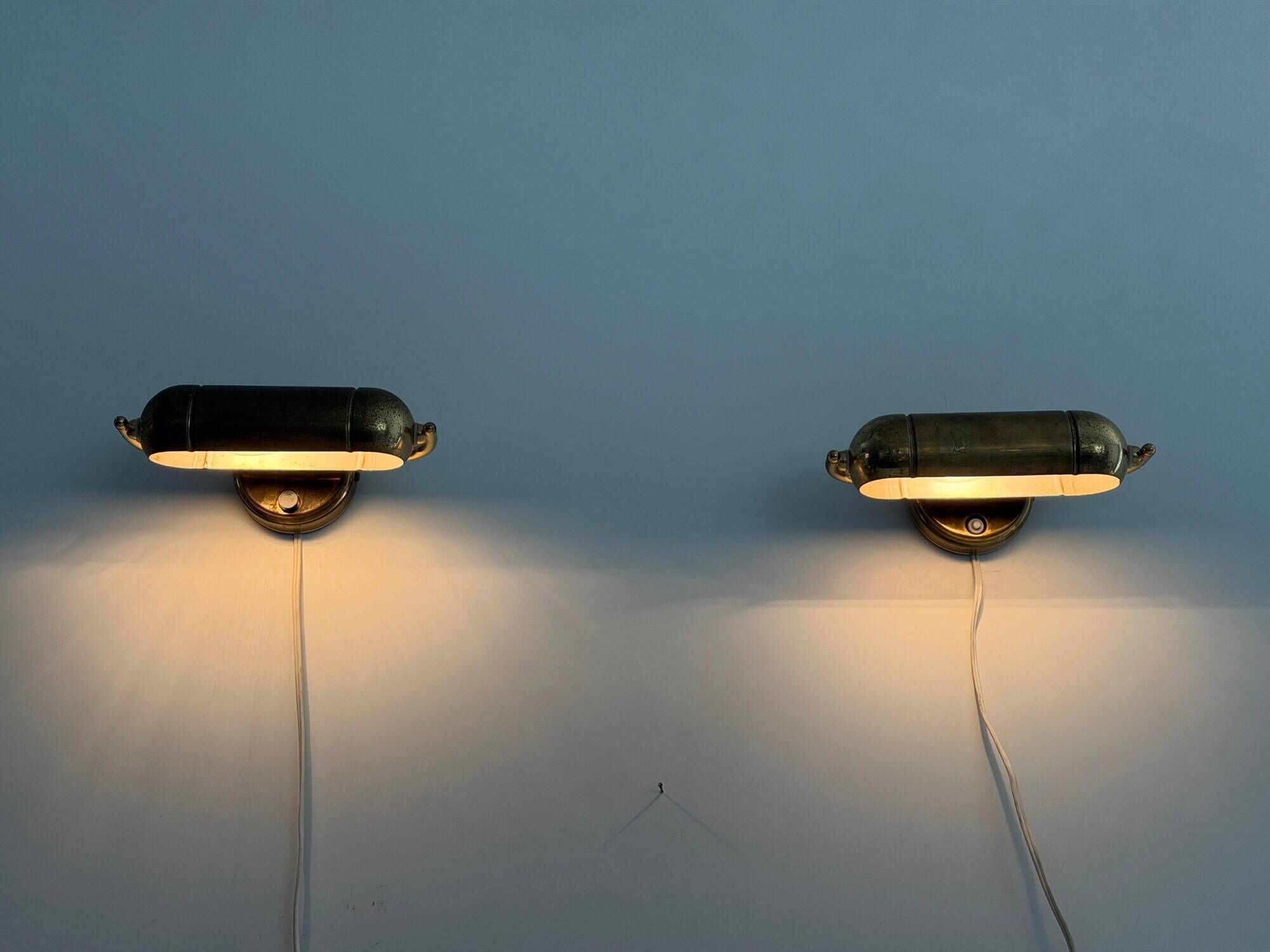 Pair of brass wall lights from the mid-century by N Leuchten, 1960s, Germany.