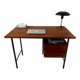 Vintage wooden and metal desk in modernist style.