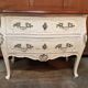 Beautiful curved chest of drawers in patinated Louis XV style