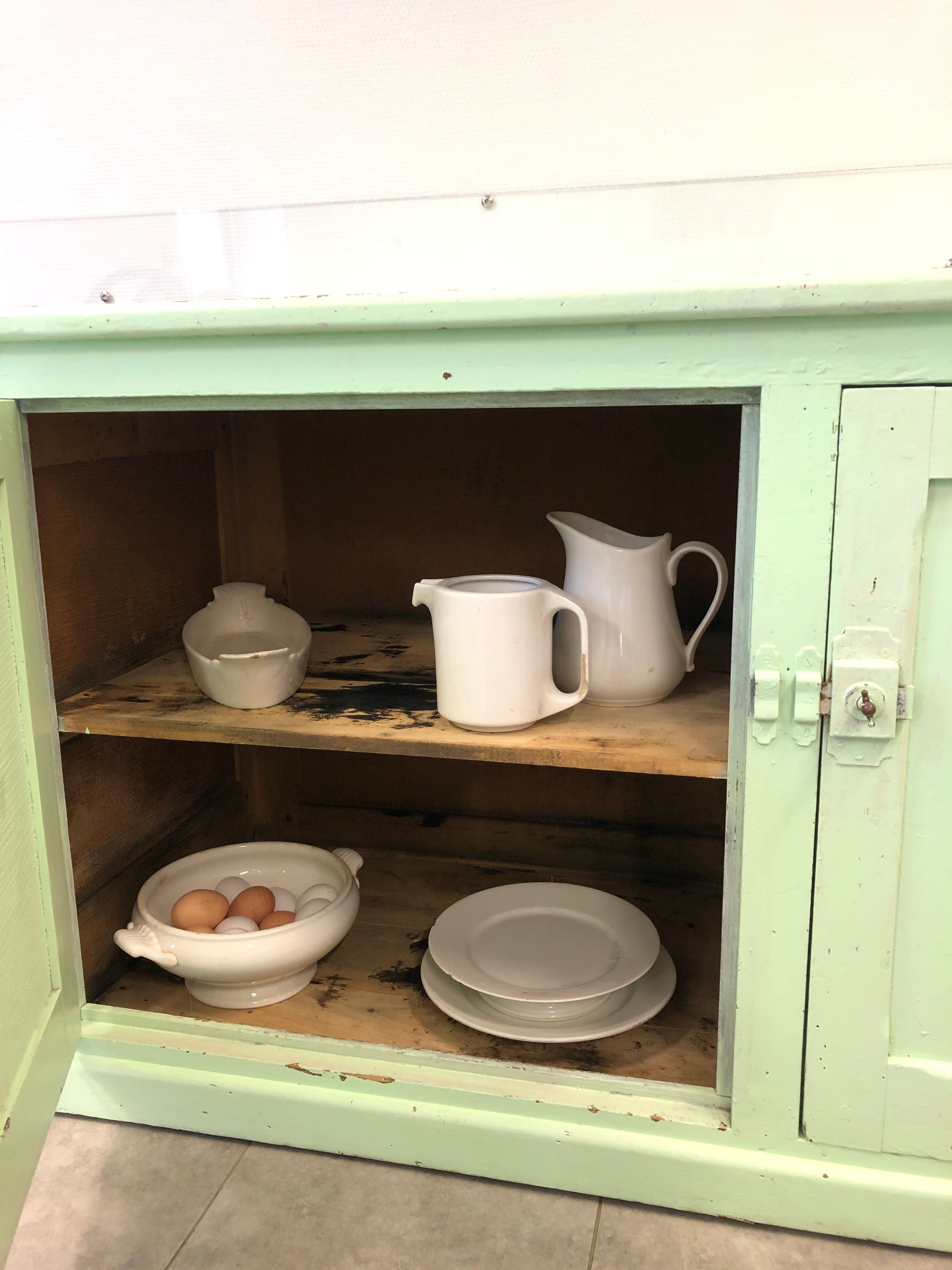 Low green patinated furniture