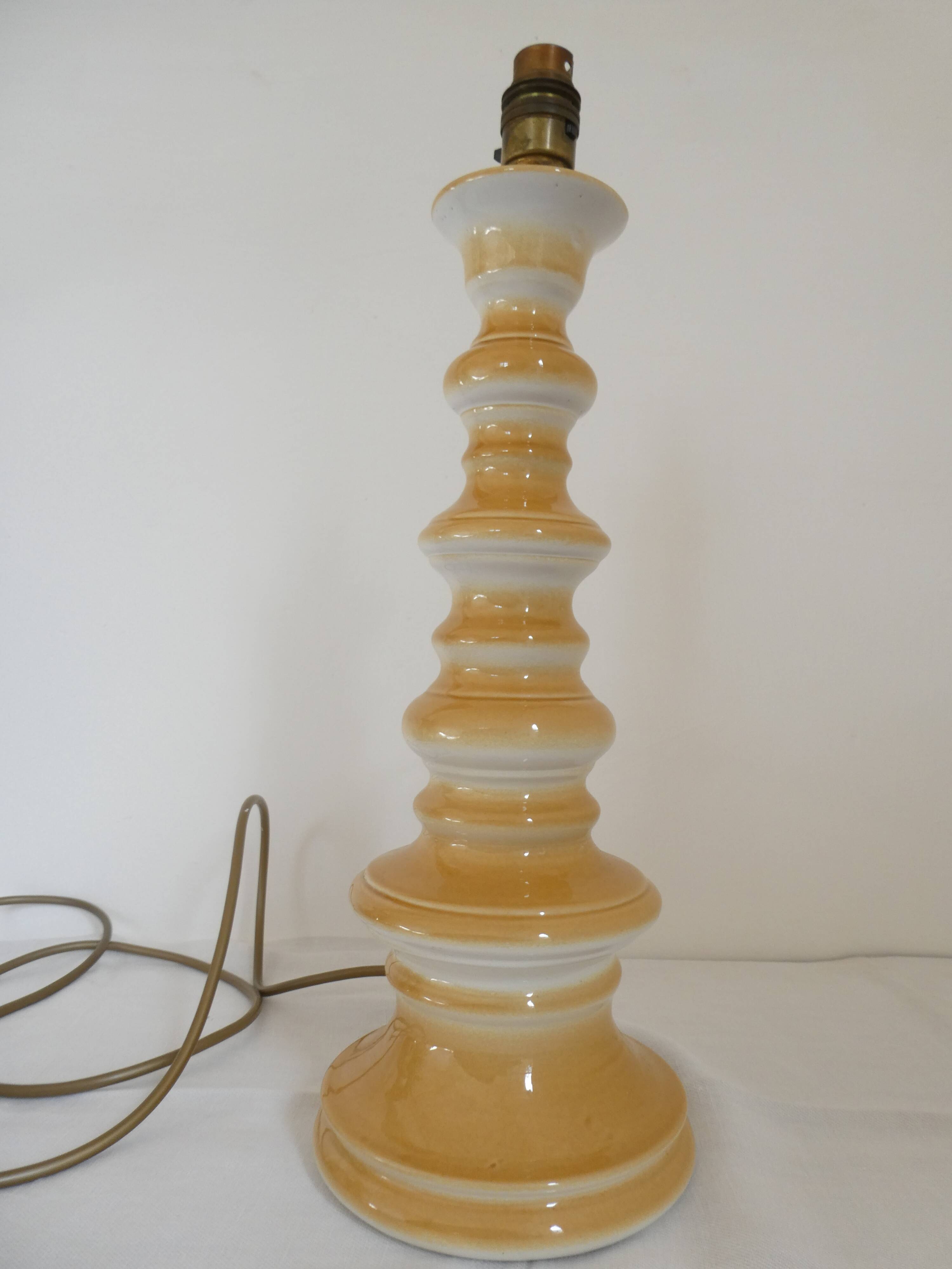 Large baluster-shaped lamp base in yellow and beige ceramic from the 1960s.