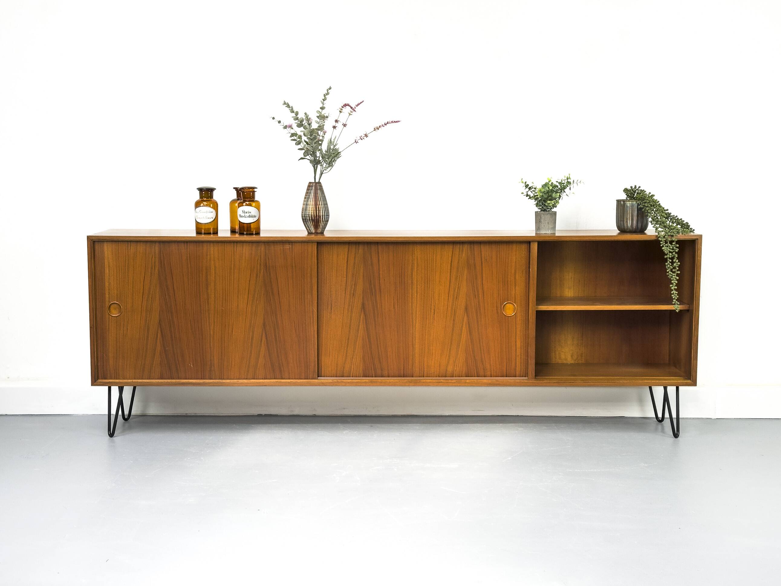 Walnut sideboard with sliding doors by Franzmeyer, 1959