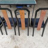 Octagonal table paul michel and its black lacquered chairs and elm magnifying glass