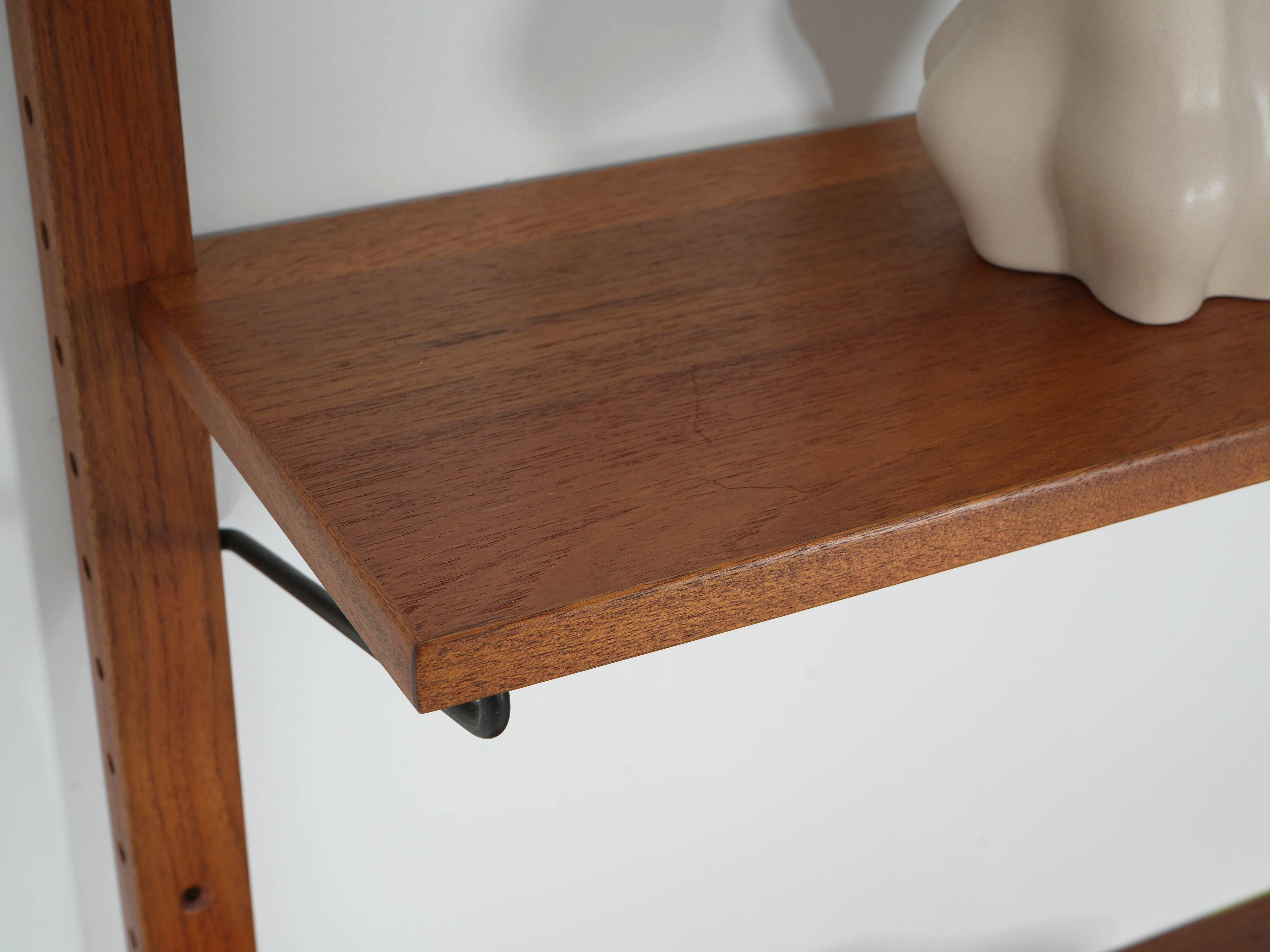 Modular shelving from the 1960s — Danish teak veneer wall system
