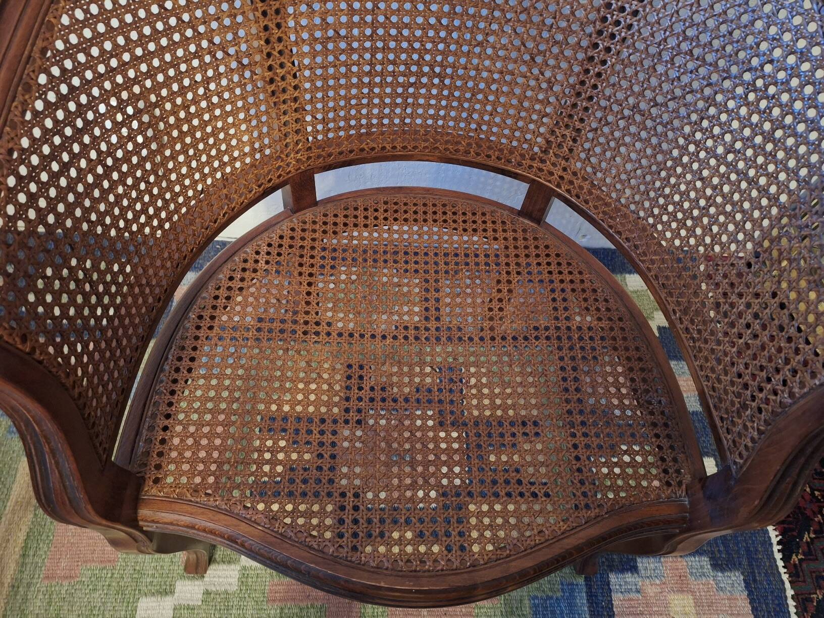 Half-moon rattan and hardwood armchair, early 20th century