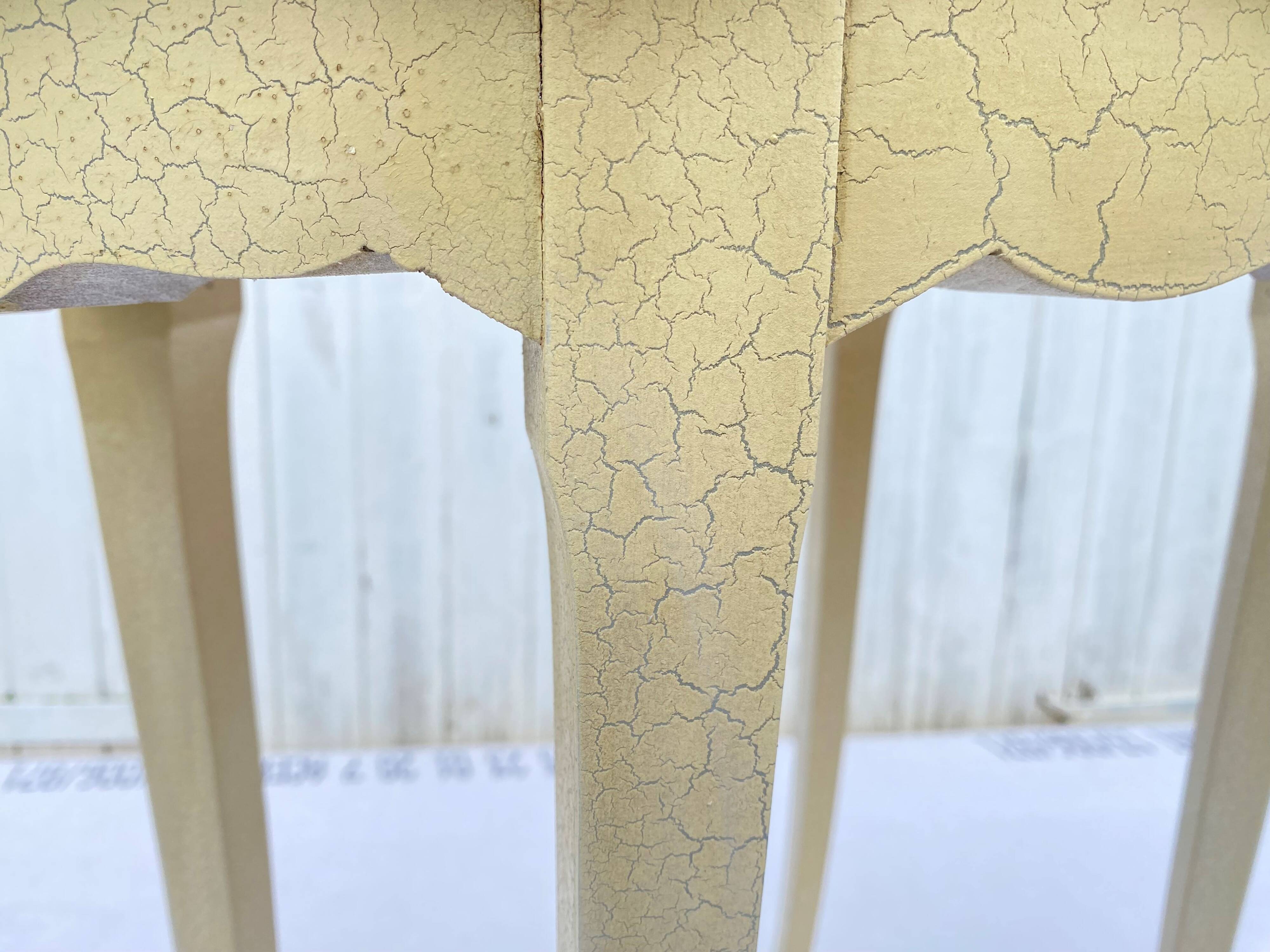 Eggshell-coloured drawer with a cracked effect side table.