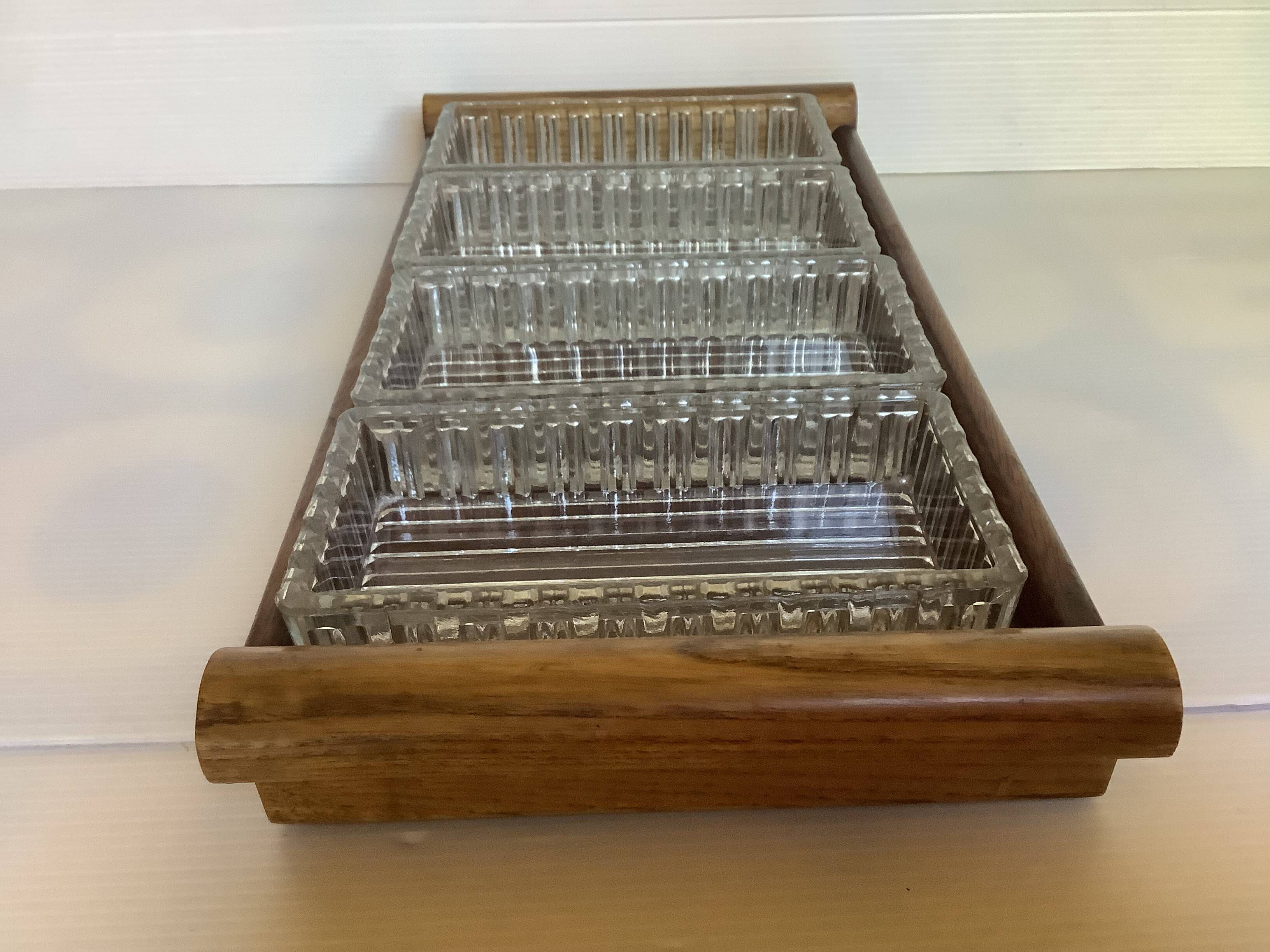 Old wooden serving tray and molded glass bowls