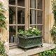 Antique enamelled cast iron planter in the Napoleon III style.