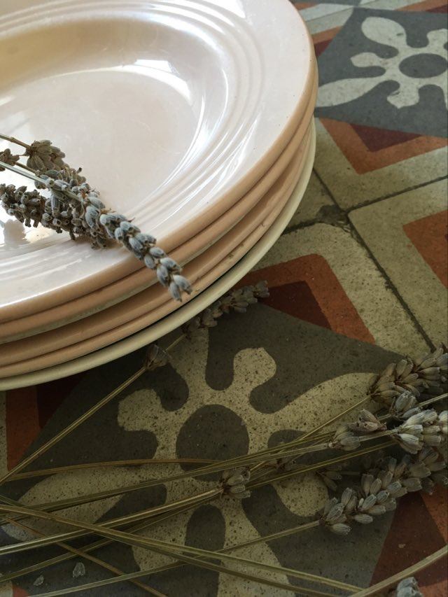 Matching old hollow plates in pink and green.