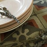 Matching old hollow plates in pink and green.