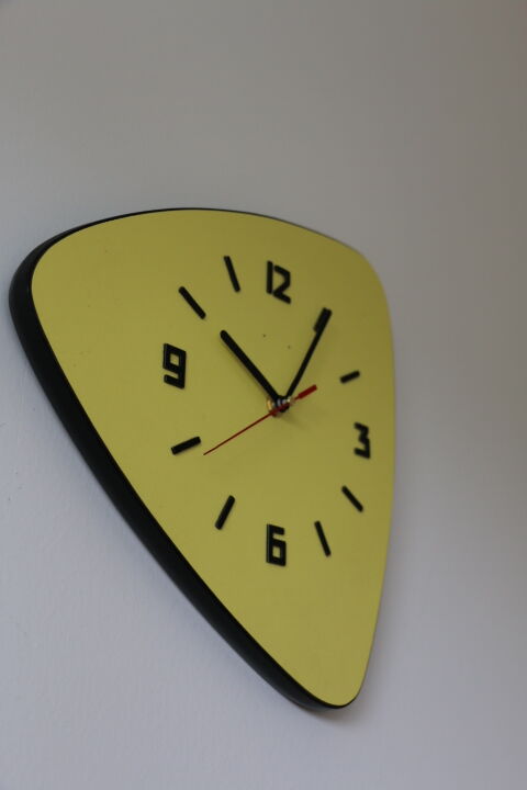 Yellow formica triangular clock