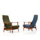 Pair of mid century Danish reclining lounge chairs in teak