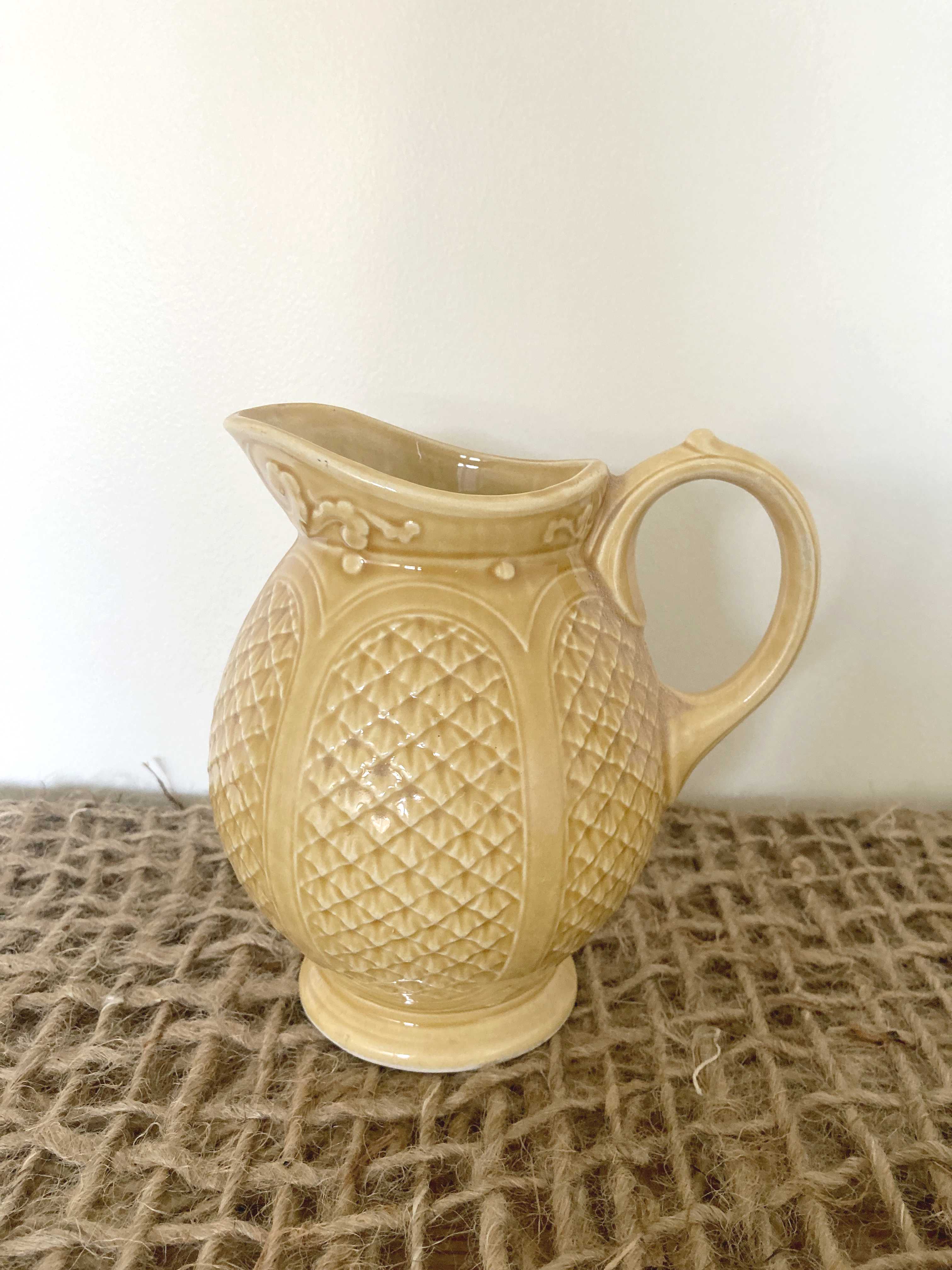 Mustard yellow ceralic pitcher