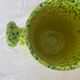 Handmade green speckled yellow ceramic vase with abstract handles