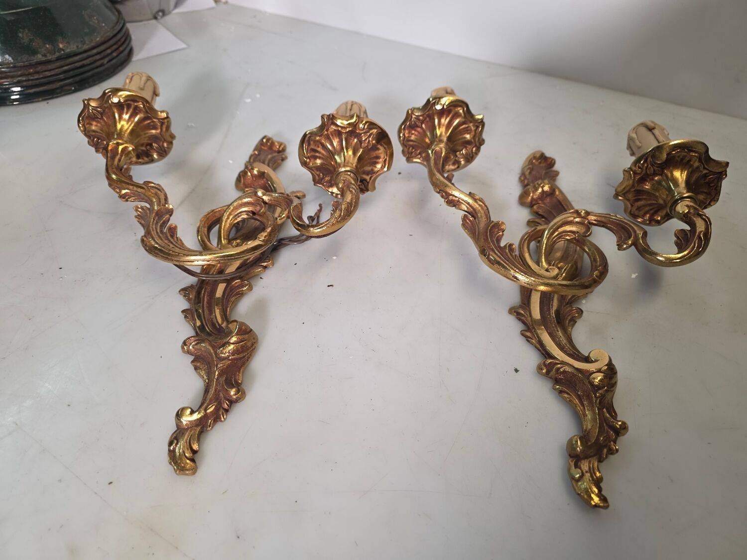 Pair of Louis XV style bronze wall sconces