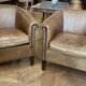 pair of camel leather club armchairs