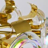 Large brass chandelier by Oscar Torlasco, rainbow optical glass rings, Italy, 1970s.