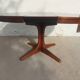round/oval table with extension, central leg, dark shade, Baumann design