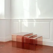 Vintage trio of nesting tables in smoked plexiglass by Michel Dumas, year
