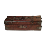 Old studded wooden box adorned with flat iron