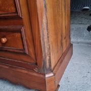 Cherry nightstand with pink marble.