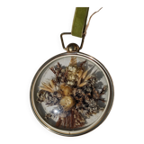 Domed frame of dried flowers