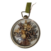 Domed frame of dried flowers