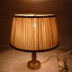 Empire style lamp in golden brass with pleated shade