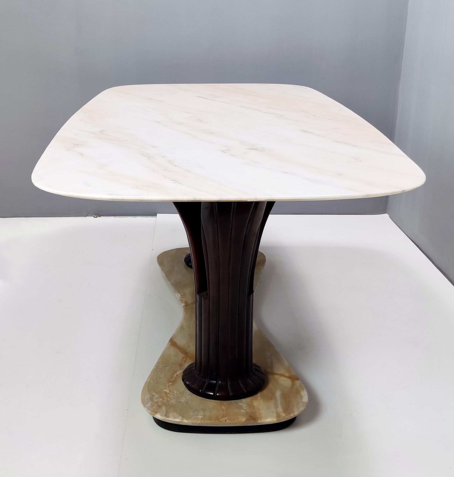 Dining table with a portuguese pink marble top