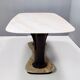 Dining table with a portuguese pink marble top