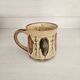 Set of 4 ceramic mugs, glazed stoneware, assorted vintage designs.