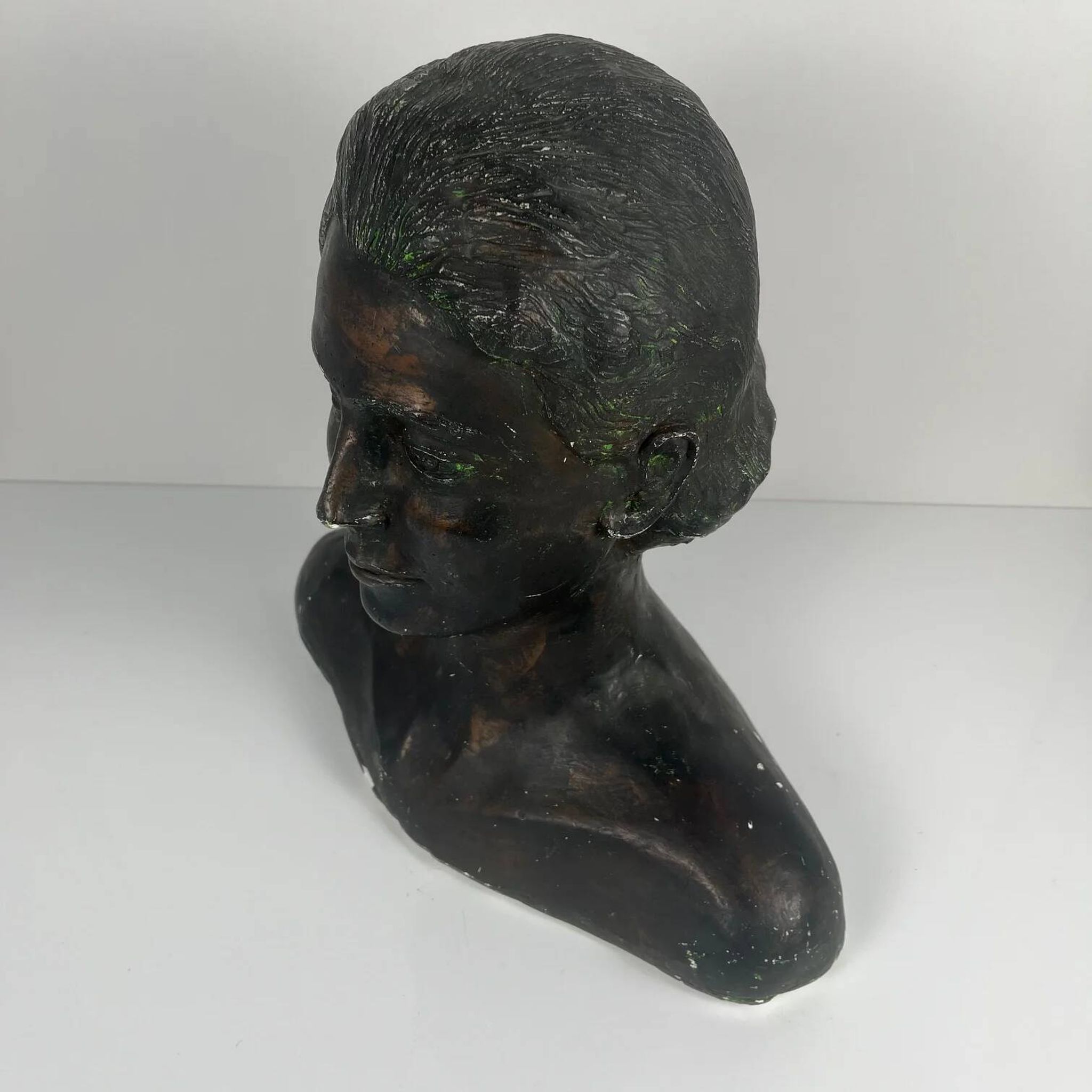 Female bust in neoclassical style in plaster by M. Mongey, 20th century.