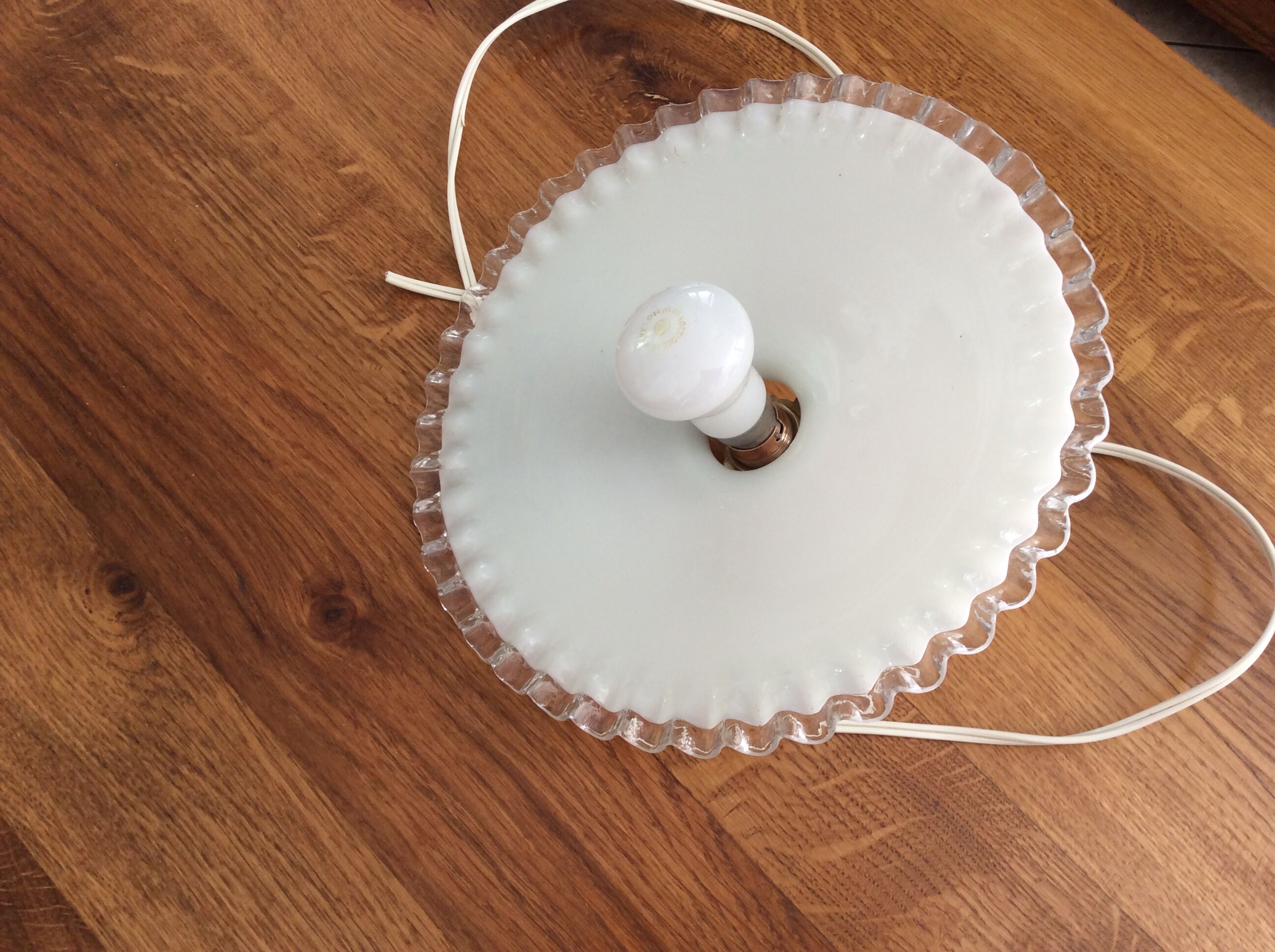 Old suspension in toothed opaline