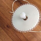 Old suspension in toothed opaline