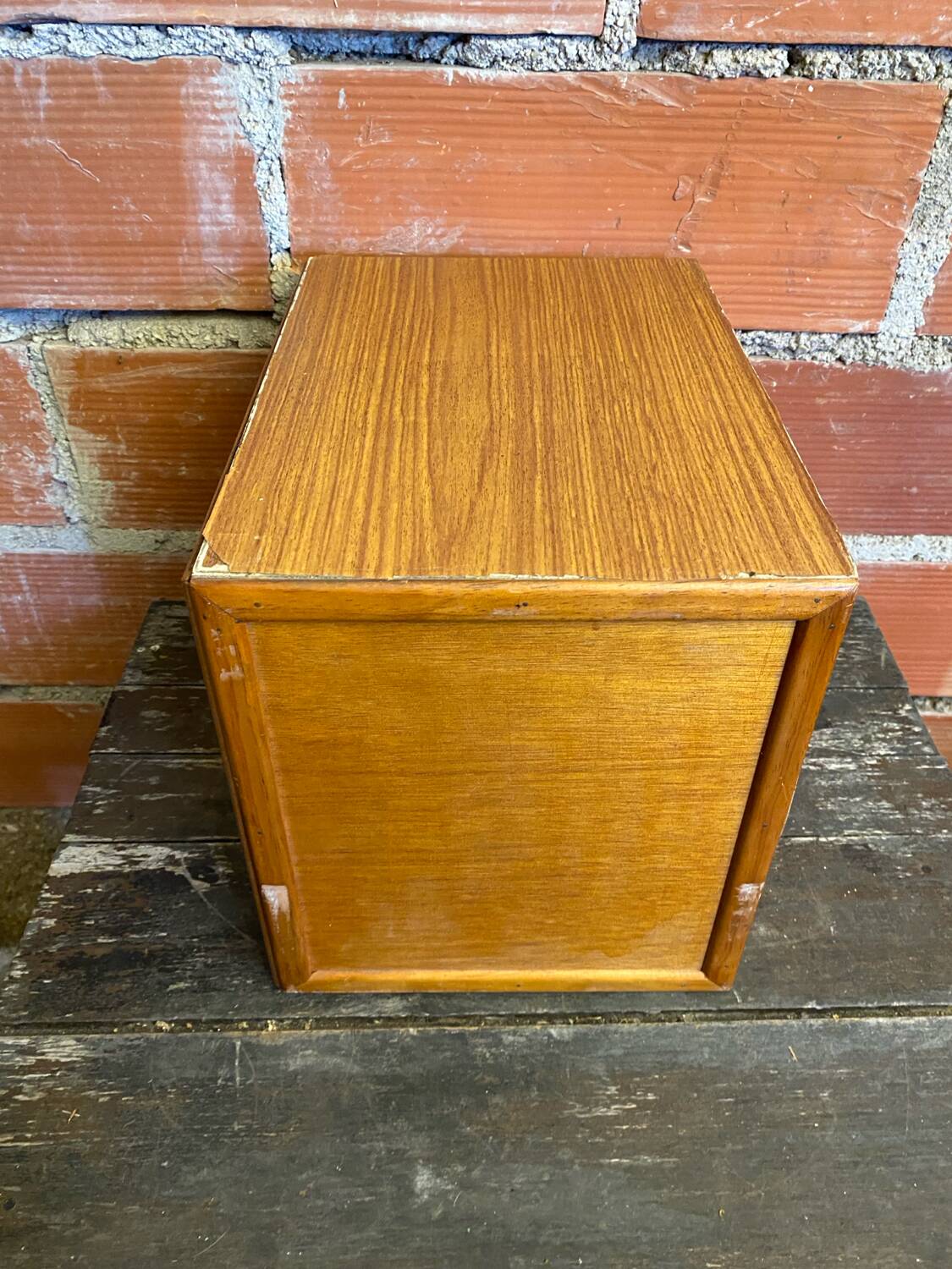 Vintage wooden storage cabinet with shelves