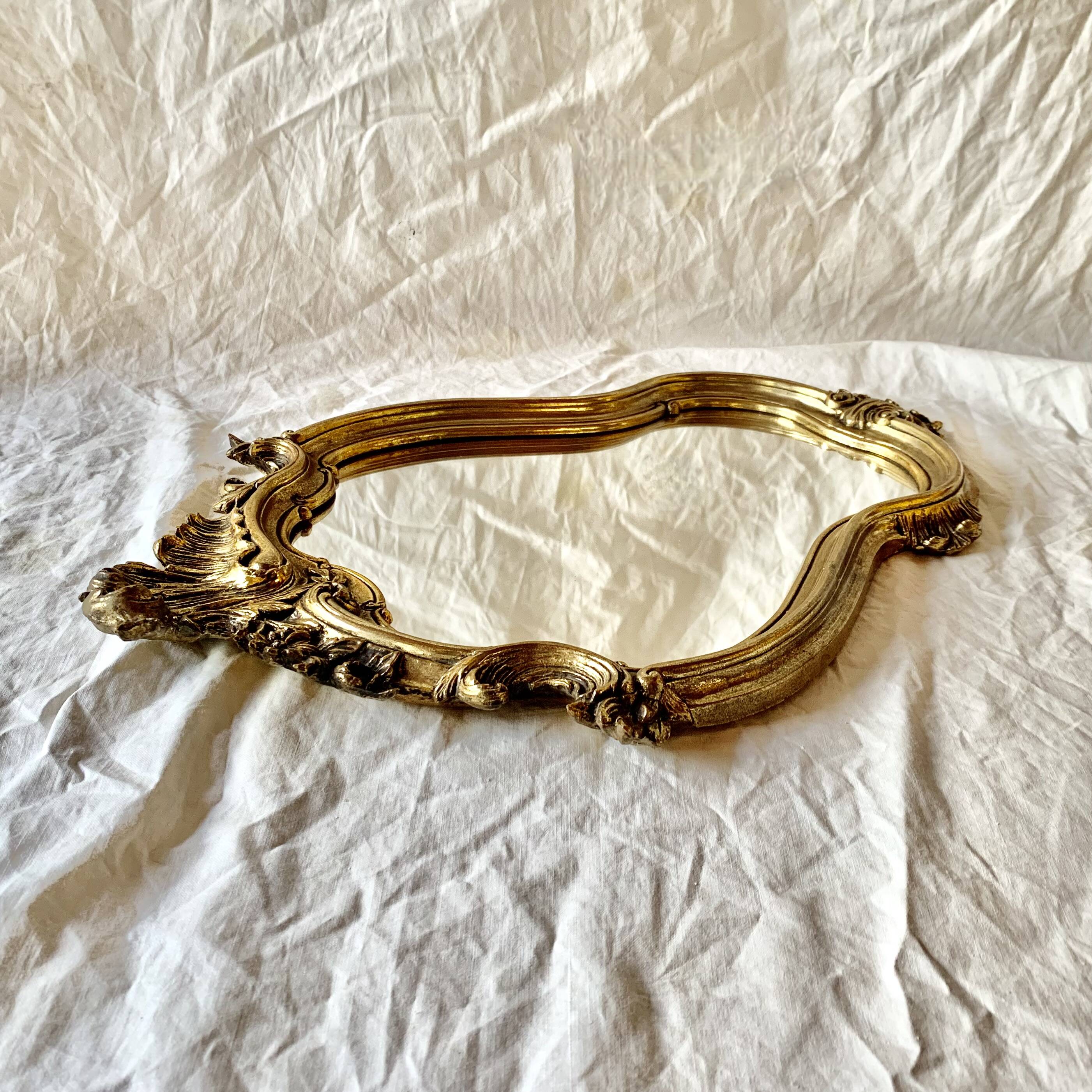 Old wall mirror in golden resin rococo style - made in france