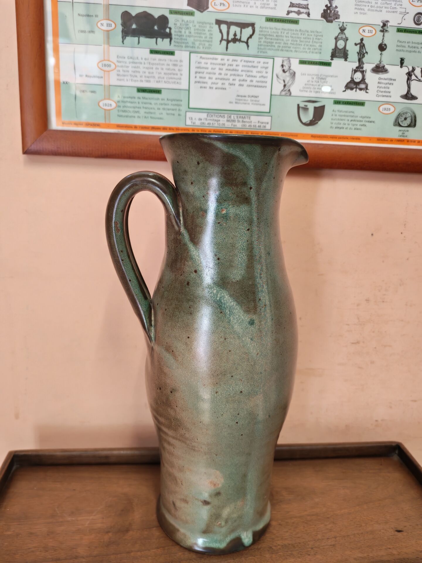 Set of three vintage ceramic jugs and a pitcher.