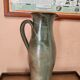 Set of three vintage ceramic jugs and a pitcher.