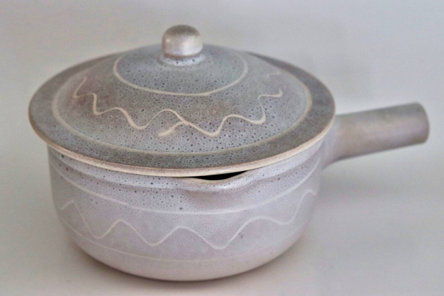 Enamelled terracotta saucepan